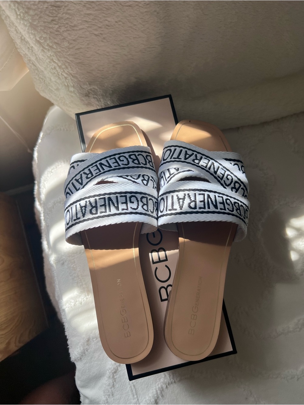 BCBGeneration White and Black Logo Slide Sandals